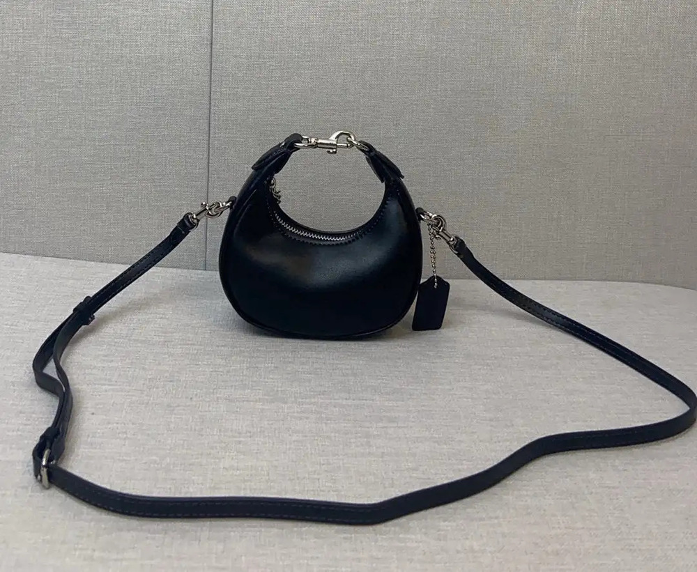 Coach black wrist bag